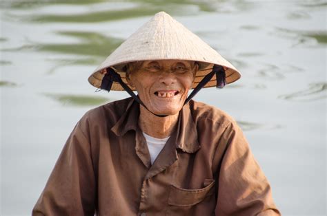 Vietnam Destinations Mekong Delta Vietnamese Man Getting Stamped