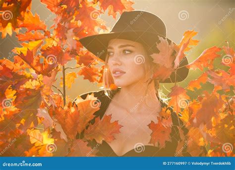 autumn romance woman with leaves female model on foliage day dream and lifestyle beauty