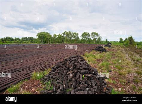 Peat Harvesting At Bog Near Drumlish Co Longford Ireland Stock Photo