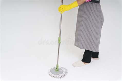 Maid Using Bloom And Dustpan Cleaning Floor Stock Image Image Of