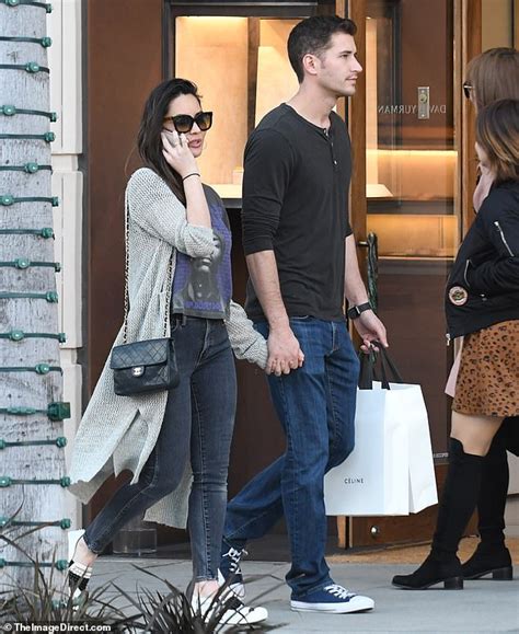 Olivia Munn Holds Hands With New Beau Tucker Roberts As Couple Steps