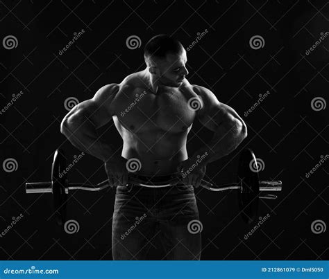 Muscular Strong Men Athlete Bodybuilder Weightlifter Does Exercises
