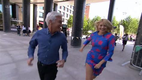 Holly Willoughby Struggles To Stop Her Knickers Flashing While