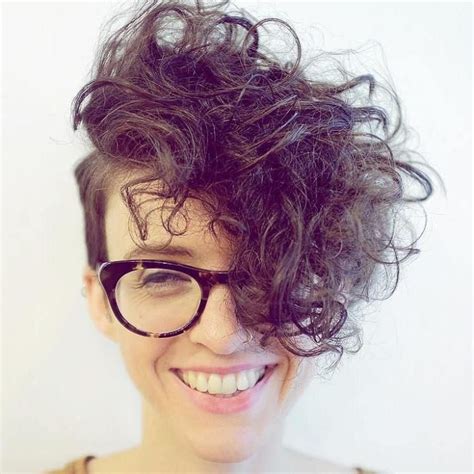 Despite what you may think, the cropped 'do works with all hair types — yes, including even the curliest of coils. Pin on short hair