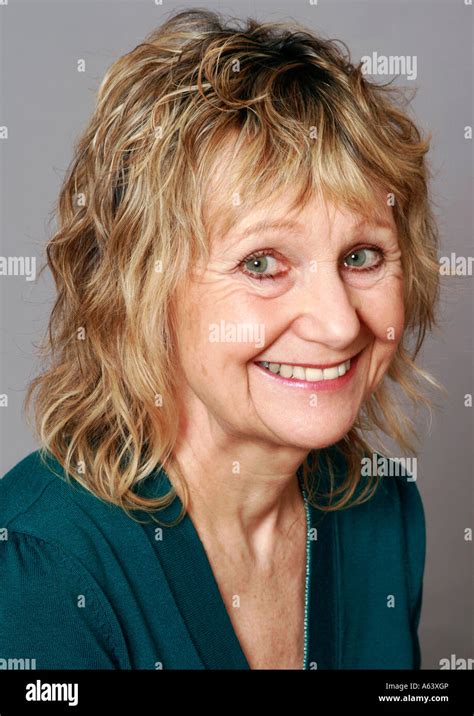 Sixty Year Old Woman Smiling Stock Photo Alamy