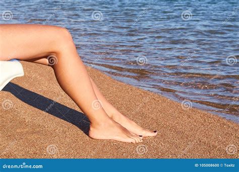 Beautiful Woman S Legs On The Beach Sand Stock Photo Image Of Body