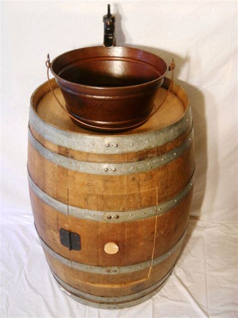 Wine Barrel Vanity With A Copper Bucket Sink By