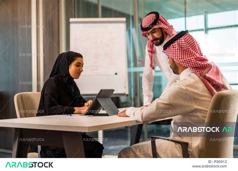 Meeting Of Arab Saudi Gulf Co Workers At Their Workplace Discussing