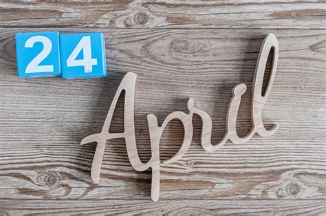 April 24th Day 24 Of Month Daily Calendar On Wooden Table Background