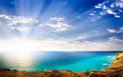 Bright Sun Shining Over The Splendid Coastline Wallpaper Beach