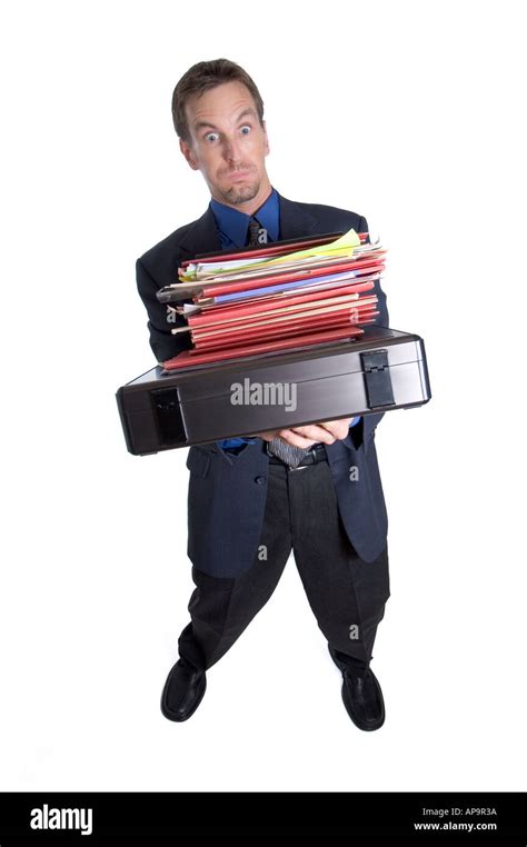 Overworked Businessman Tipping Over From Carrying Too Many Folders
