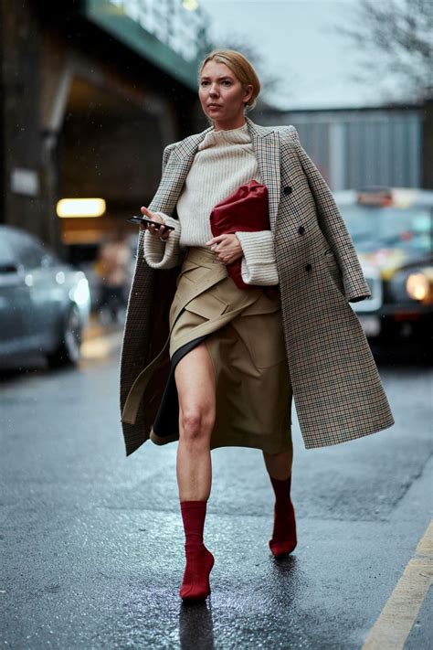 the street style crowd carried on with london fashion week in classic trench coats autumn