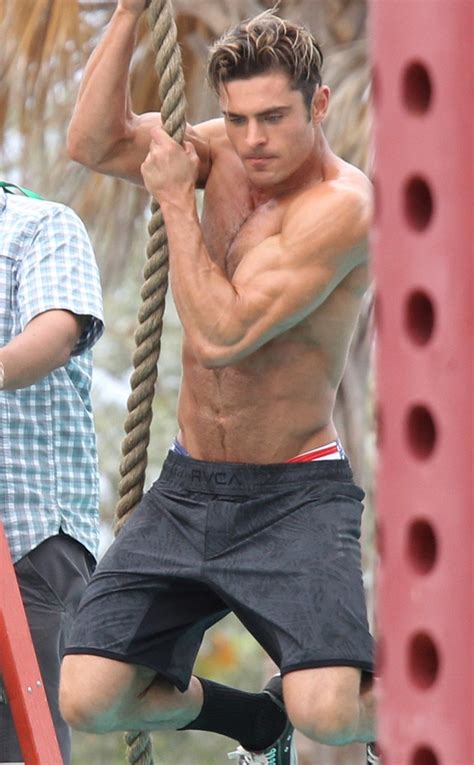 Swinging Into Action From Zac Efrons Shirtless Pics E News
