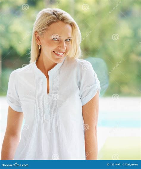 stock image portrait of a beautiful smiling middle aged female image 12314921