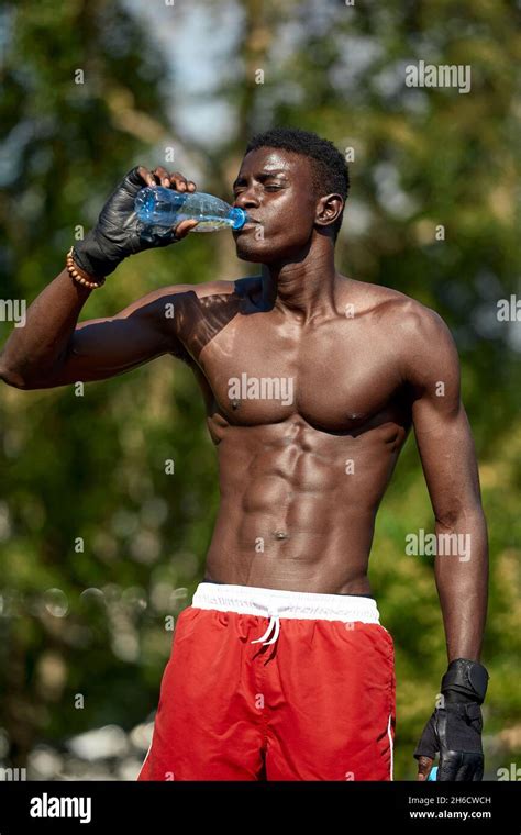 Africa American Sportsman Drinking Fresh Water After Training Stock