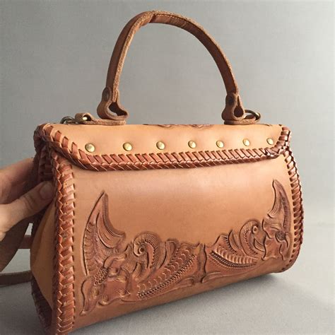 cross body tooled leather handbag