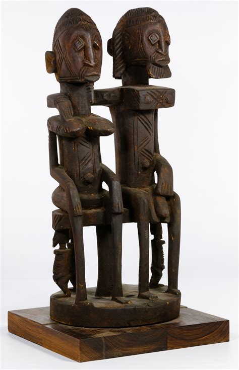 African Dogon Carved Wood Couple Sculpture Sold At Auction On 19th