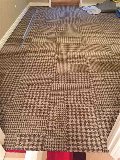 A View Of A Herringbone Carpet Tile Install Tile Installation Carpet