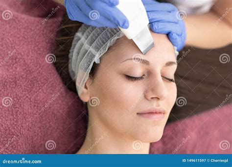 Beautiful Woman Receiving Ultrasound Cavitation Facial Peeling In