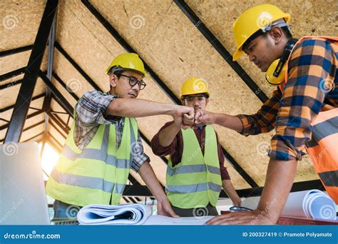Construction Teamwork Team Of Engineer And Architects Working Join