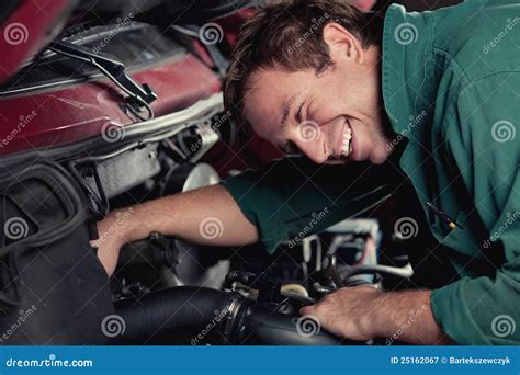 Mechanic Fixing Auto In Car Service Stock Image Image Of Looking