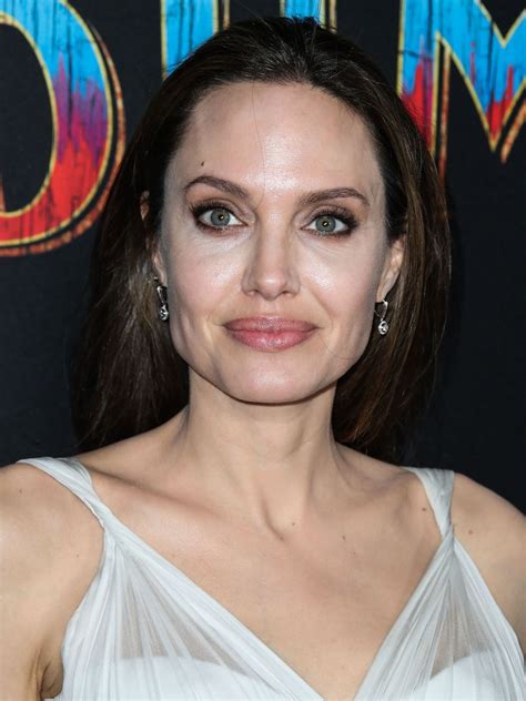 Née voight, formerly jolie pitt, born june 4, 1975) is an american actress, filmmaker, and humanitarian. Hollywood's Hottest MILF Angelina Jolie Shows Her Cleavage - The Fappening!