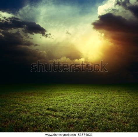 Storm Dark Clouds Over Field Grass Stock Photo Edit Now 53874031