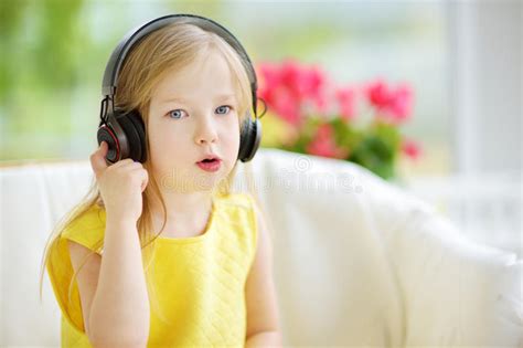 Cute Girl Wearing Huge Wireless Headphones Pretty Child Listening To
