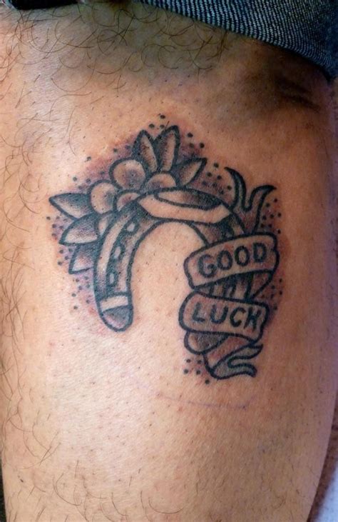 Cute Horseshoe For Good Luck And Flowers Tattoo Tattooimagesbiz