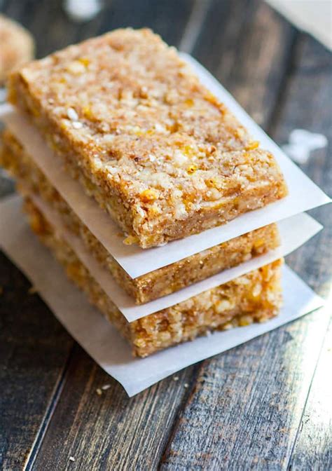 These delicious homemade snack bars pack a punch of protein but don’t include the added suga. Mango Coconut Almond Paleo Protein Bars - Cotter Crunch