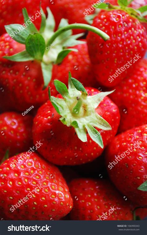 Closeup Of Fresh Strawberries As Background Stock Photo 106990343