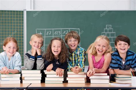 Laughing Group Of School Kids In Class — Stock Photo © Racorn 51325015