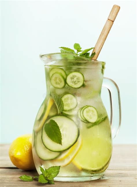 Infused Water With Cucumber Lemon Lime And Mint Stock Image Image