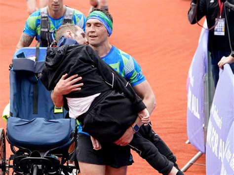 Moment Rob Burrow Carried Over Finish Line By Kevin Sinfield At Leeds Marathon