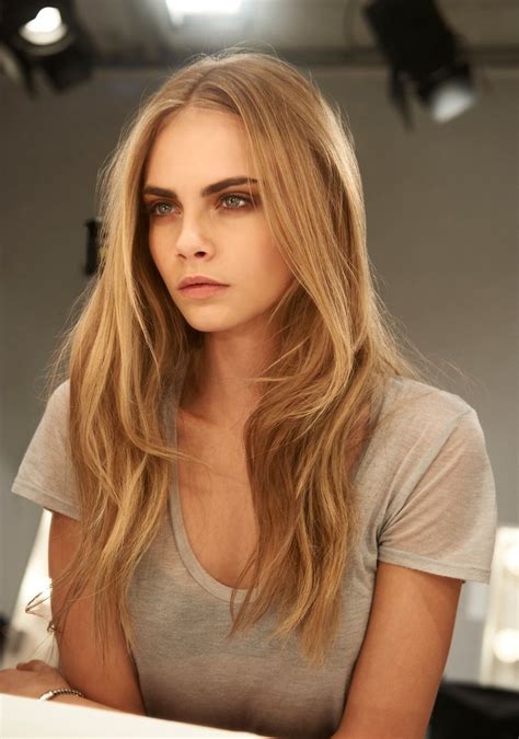 Cara Delevingne Dirty Blonde Hair With Light Waves Thick Eyebrows