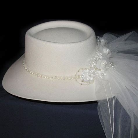 This Wedding Hat Is Called The Ivory Telescope Bridal Hat From