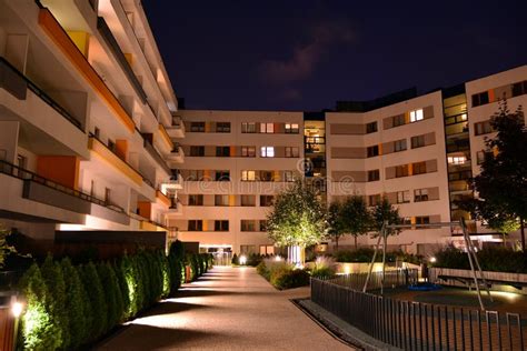 Exterior Of Apartment Building At Night Stock Image Image Of