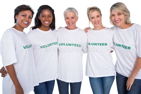 Group Of Female Volunteers Smiling At Camera Stock Photo Image 32511446