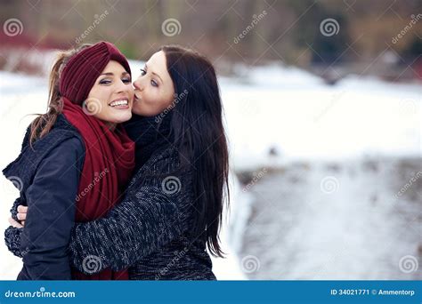 Attractive Female Kissing Her Friend On The Cheek Stock Image Image Of Kiss Park 34021771