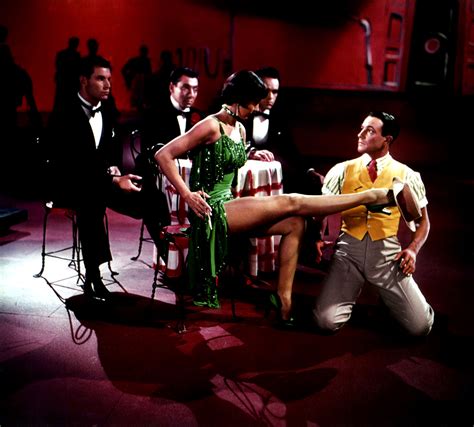 cyd charisse and gene kelly in dance segment broadway melody from singin in the rain 1952