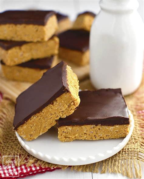 Graham cracker crumbs are mixed in with the peanut butter. No-Bake Crispy Chocolate Peanut Butter Bars - Iowa Girl Eats