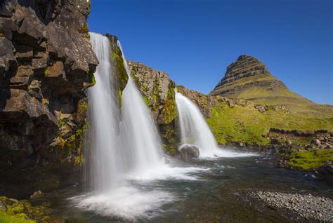 Kirkjufellsfoss Waterfall And Kirkjufell Mountain In Iceland Iceland