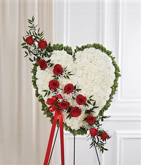 Maybe you would like to learn more about one of these? White Flowers & Red Roses Standing Heart at From You Flowers