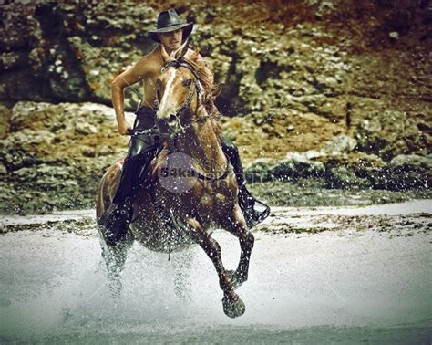 Cowboy Riding Horse In The Water And Splash Water Drops Photography