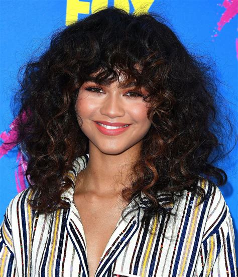 Curly Bangs Are Everywhere Right Now — Heres How To Wear Them