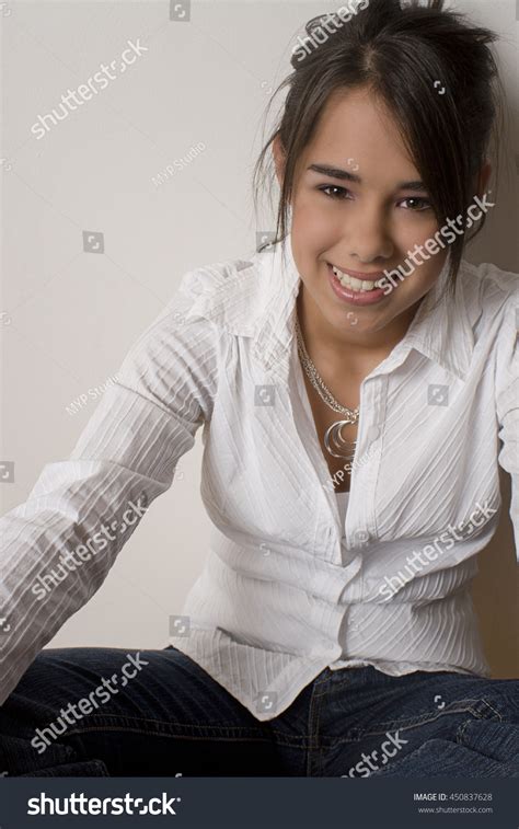 Young Teen Girl Sitting Cross Legged Stock Photo 450837628 Shutterstock