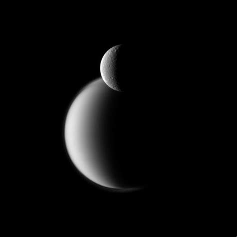 Nasa Releases Detailed Cassini Photos Of Saturns Moon Rhea Photos