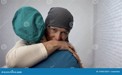 Depressed Woman Crying And Hugging Oncologist Expensive Treatment