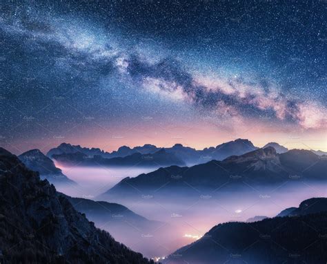 Milky Way Over Mountains In Fog Stock Photo Containing Milky Way And