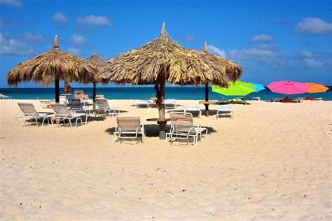 Empty Loungers At Eagle Beach Near Oranjestad Aruba Encircle Photos